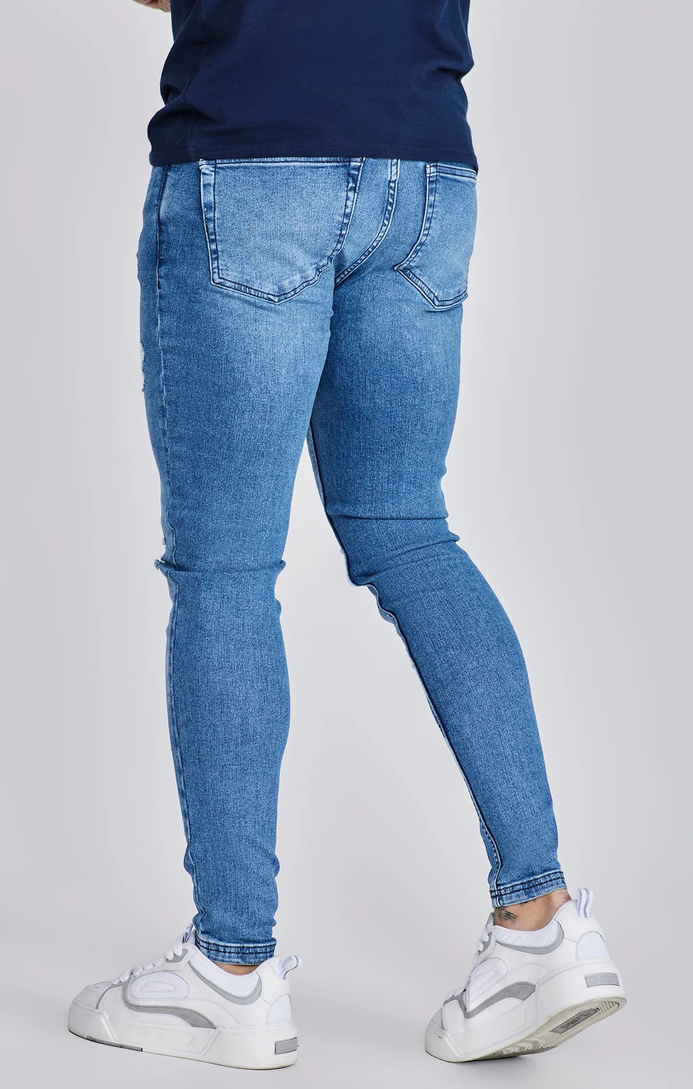 Jeans delgados angustiados azules Siksilk