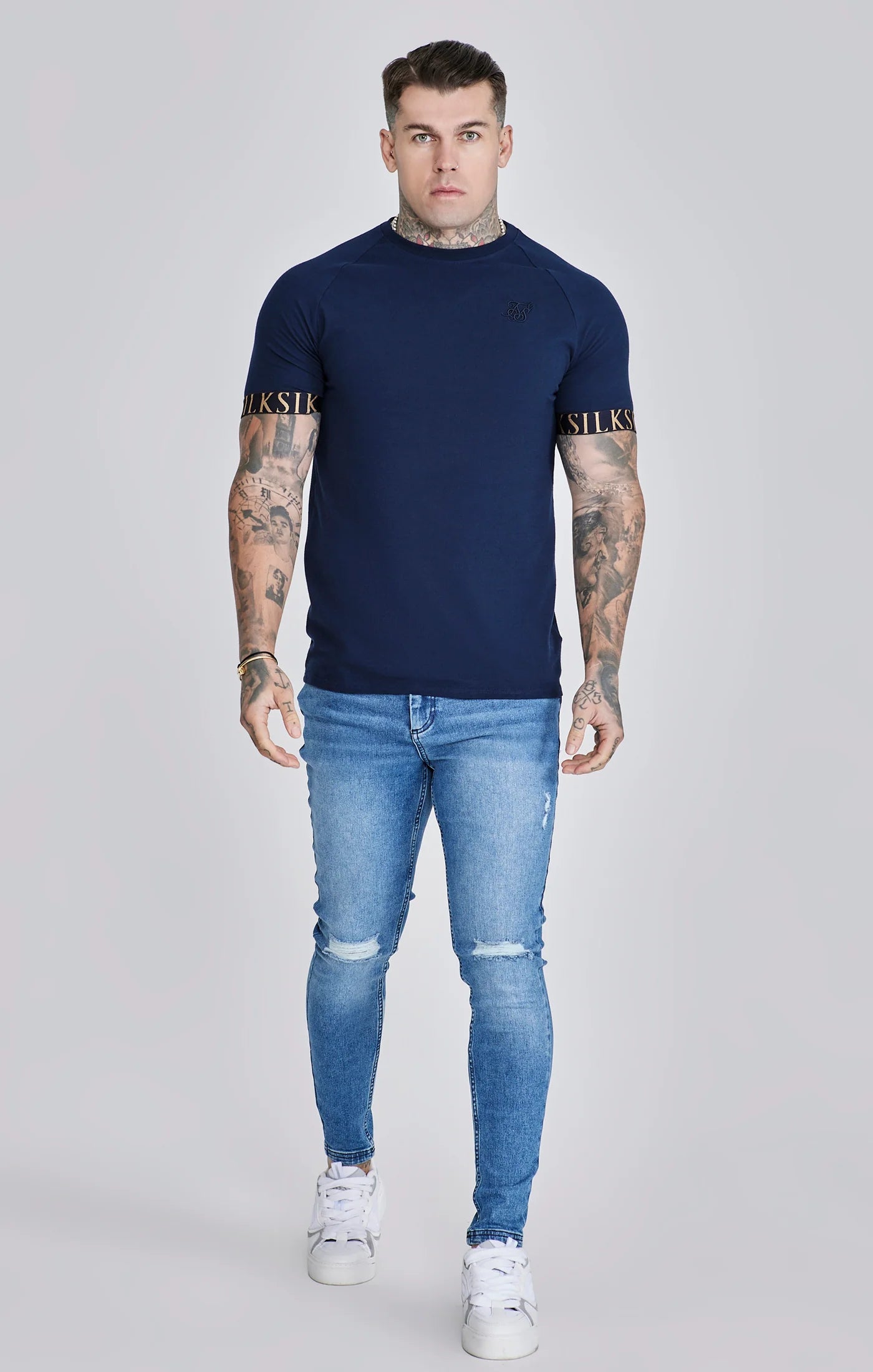 Jeans delgados angustiados azules Siksilk