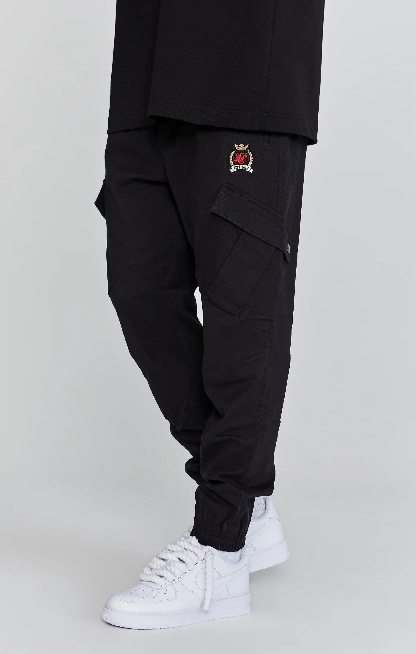 Pantalones tipo cargo negros