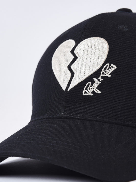 Gorra ajustable unisex Broken Heart Negra